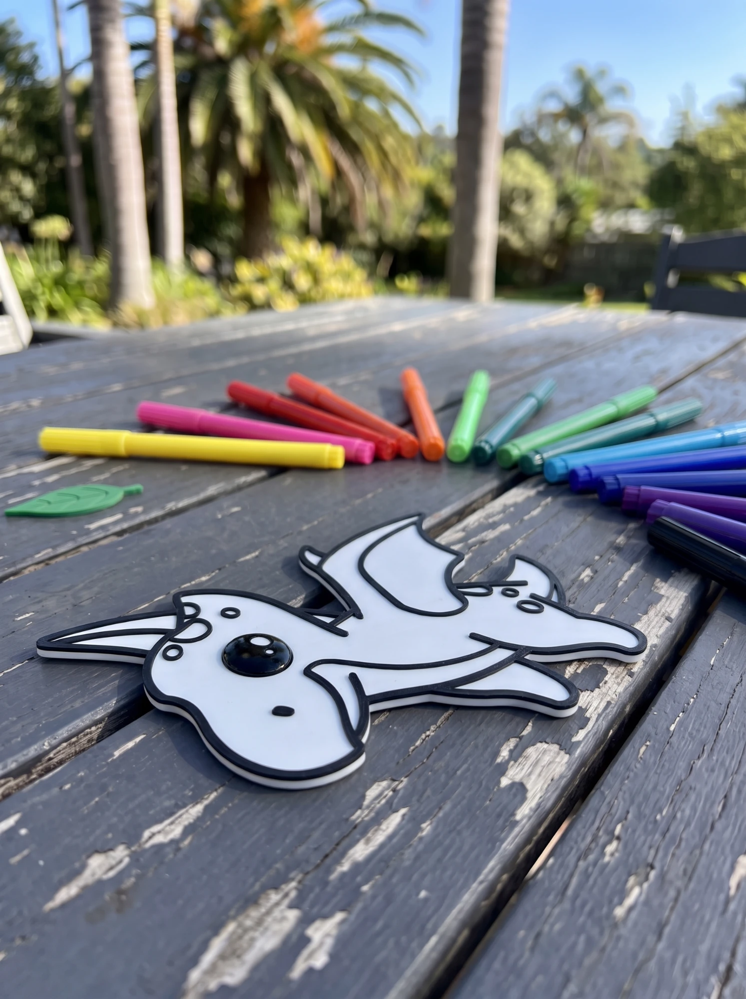 Flying Dino with washable markers in the garden