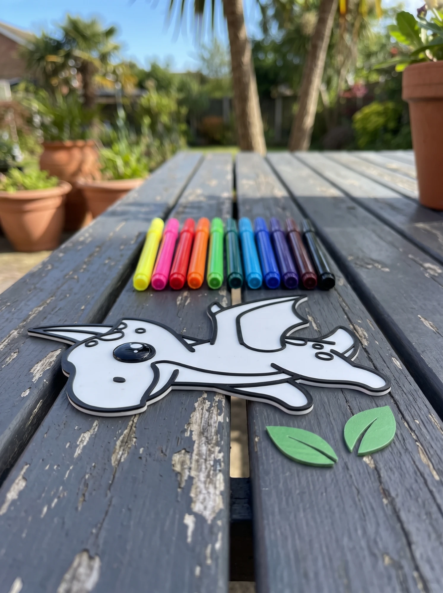 Flying Dino with a row of markers