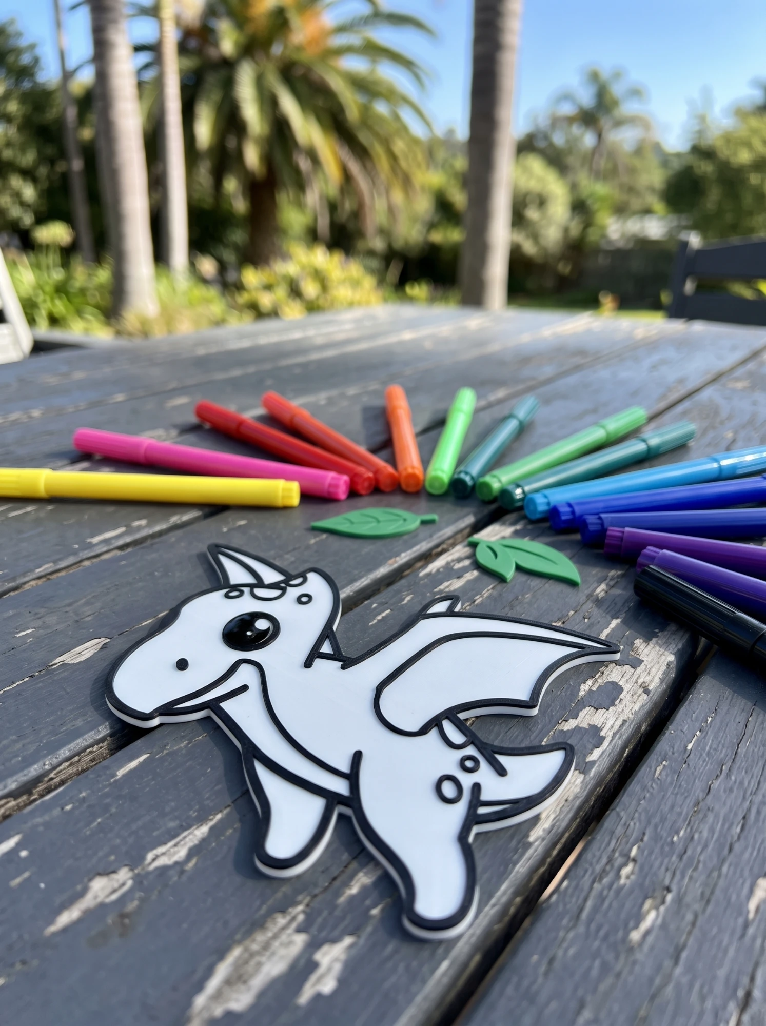 Flying Dino with leaves and markers