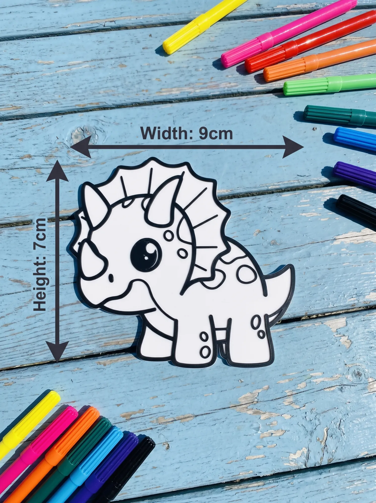 Triceratops – size 9 × 7 cm